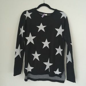 Francesca’s Star pattern slit side sweater. Size M